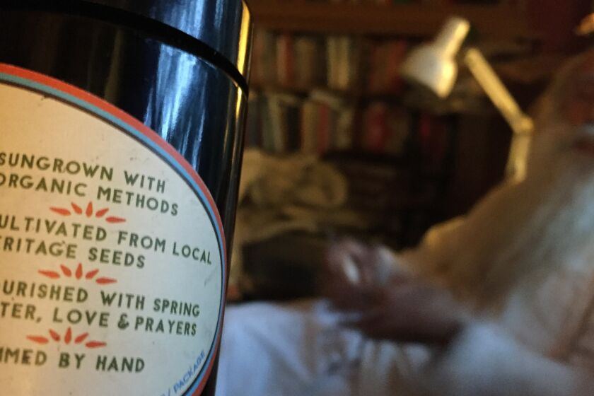 Swami Chaitanya, a Mendocino County cannabis grower, supports legalization and thinks that branding will be the key to his and other farmers' success. His Swami Select brand, whose label is shown here, is packaged in UV-resistant violet glass jars to keep it fresher longer.